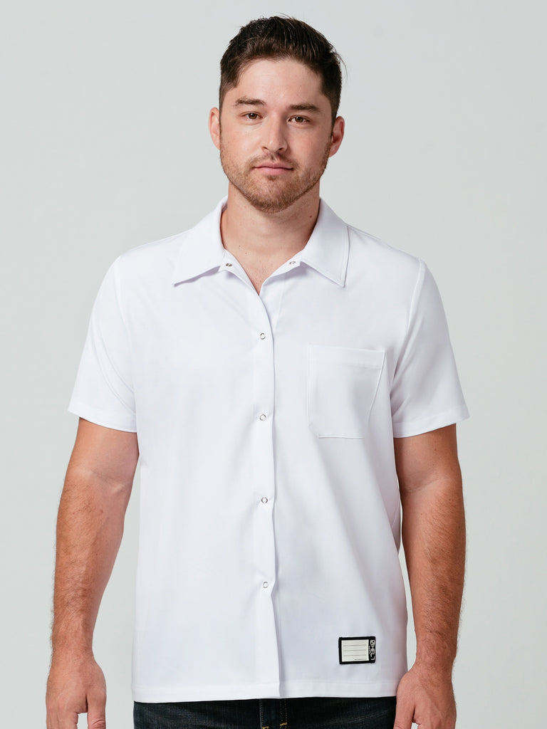 Man modeling Helt's Utility Work Shirt in white.