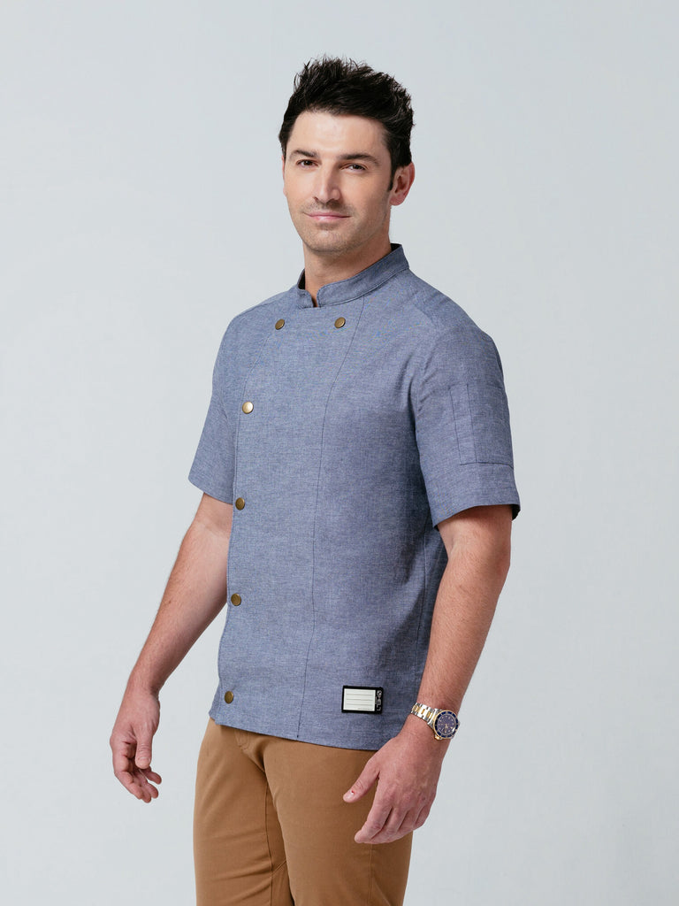Man modeling Helt Studio's Midtown Chef Coat Denim.