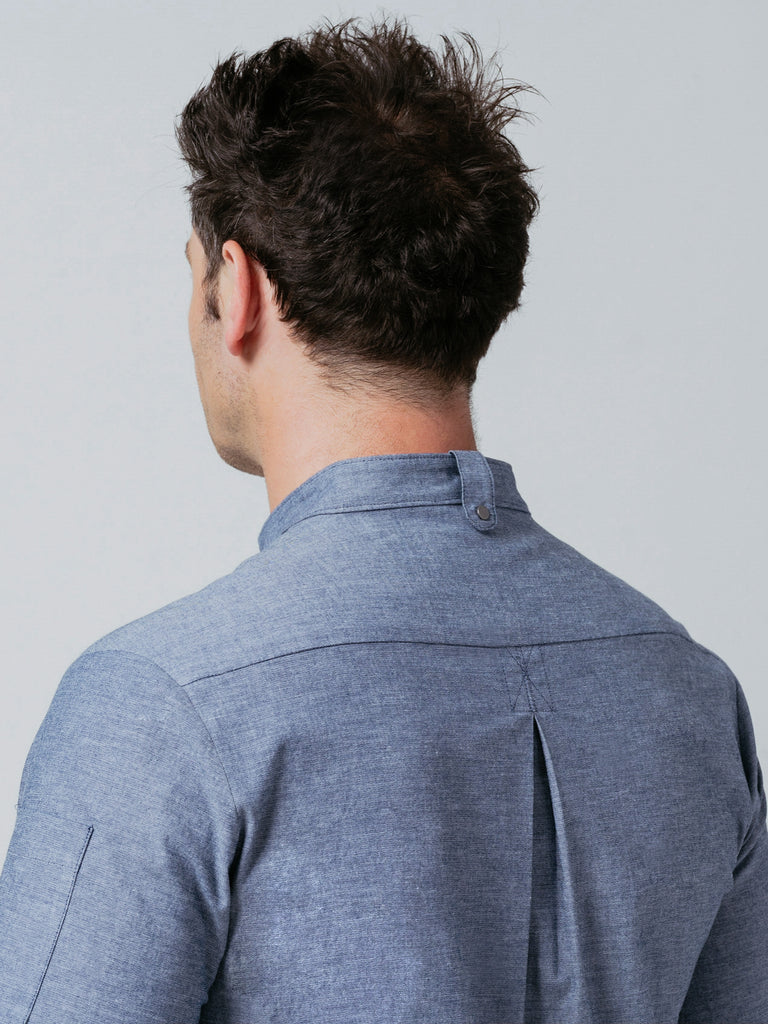 Close up of man modeling the rear collar of Midtown Chef Coat Denim.