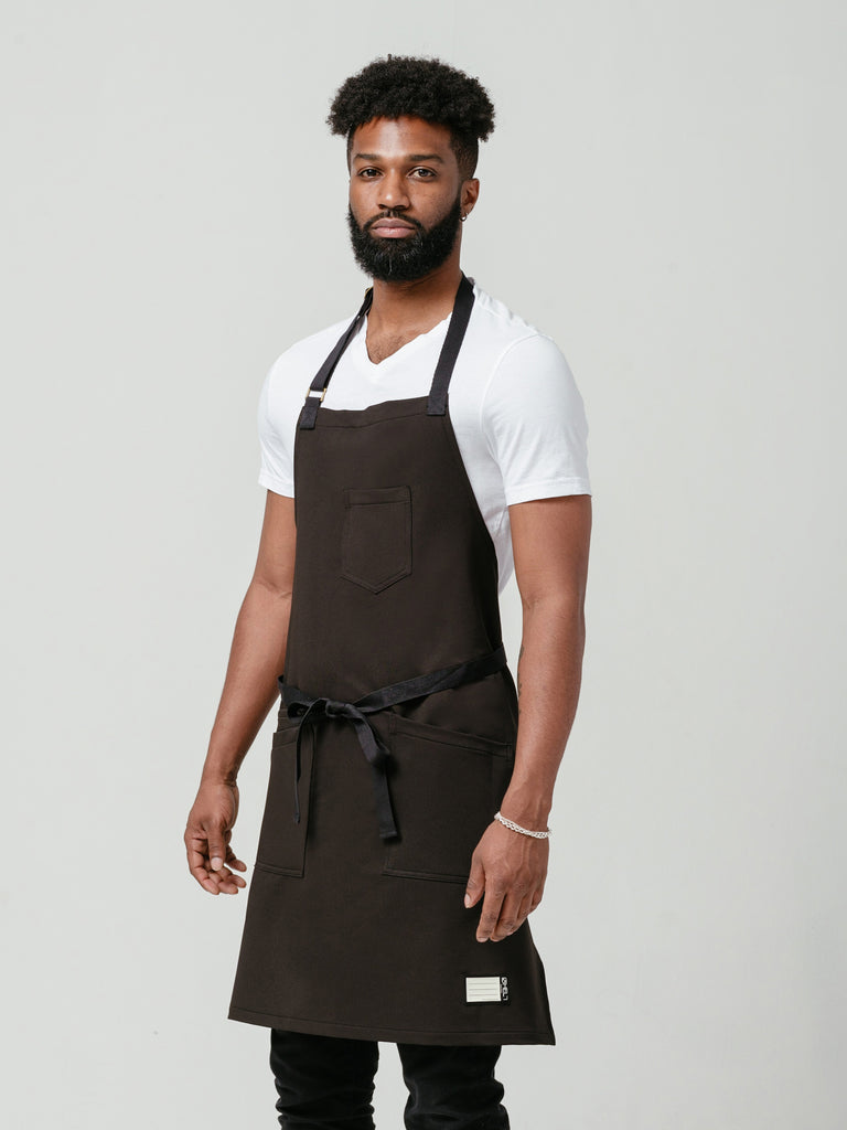 Man modeling Helt Studio's Noir CrewTech Apron.