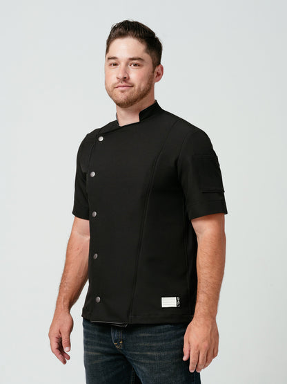 Man modeling Helt Studio's Hipster Chef Coat Noir.