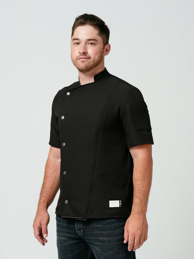 Man modeling Helt Studio's Hipster Chef Coat Noir.