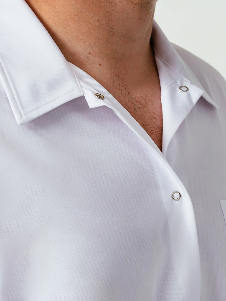 Close up of collar details on man modeling Helt Studio's Utility Work Shirt in white.